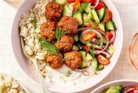 Harissa Lamb Meatball Bowls with Yogurt and Couscous