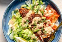 Grilled Cajun Fish Bowl Recipe with Spiced Rice and Avocado