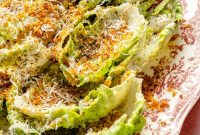 Little Gem Salad Tossed in Creamy Cacio e Pepe Dressing