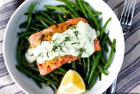 Oven-Baked Lemon Salmon Recipe with Creamy Dill Sauce