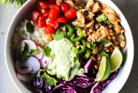 Chipotle Fish Taco Bowls with Creamy Avocado Cilantro Sauce