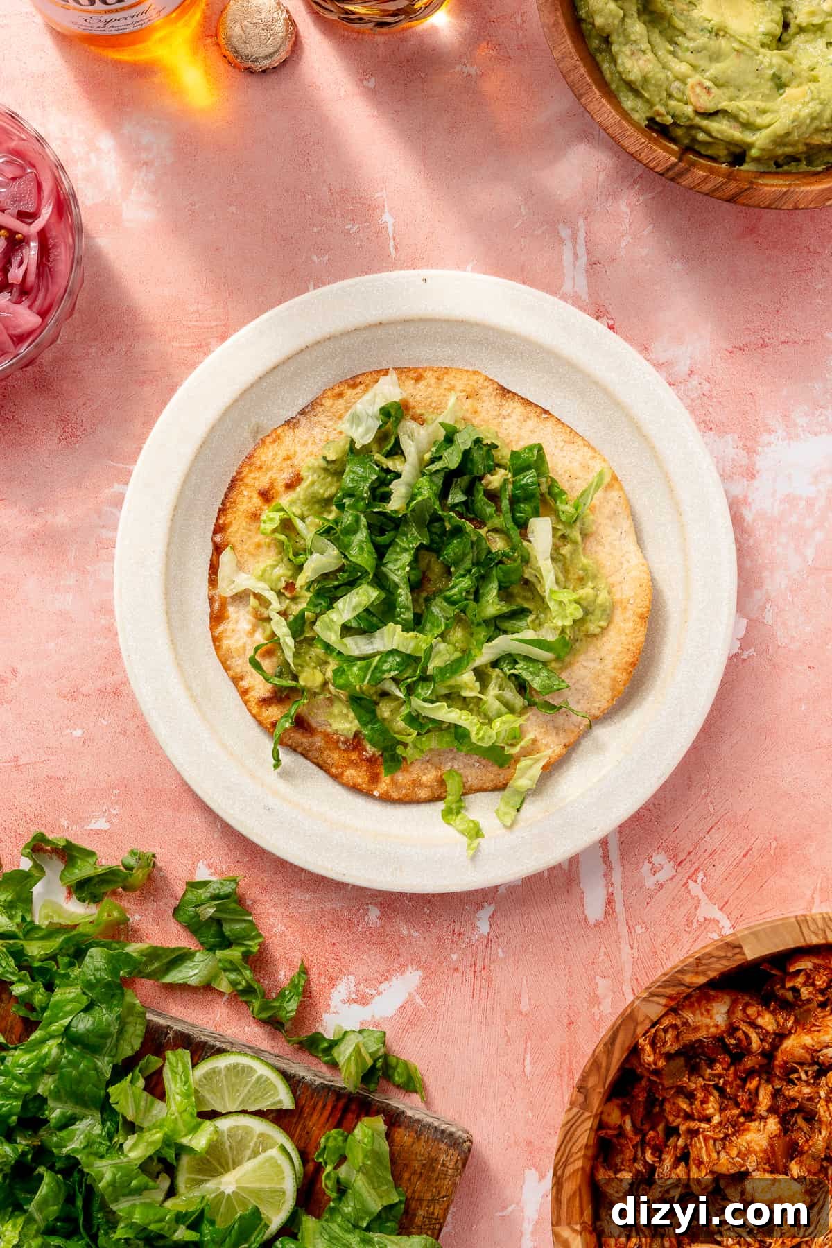 Assembled tostadas with toppings.