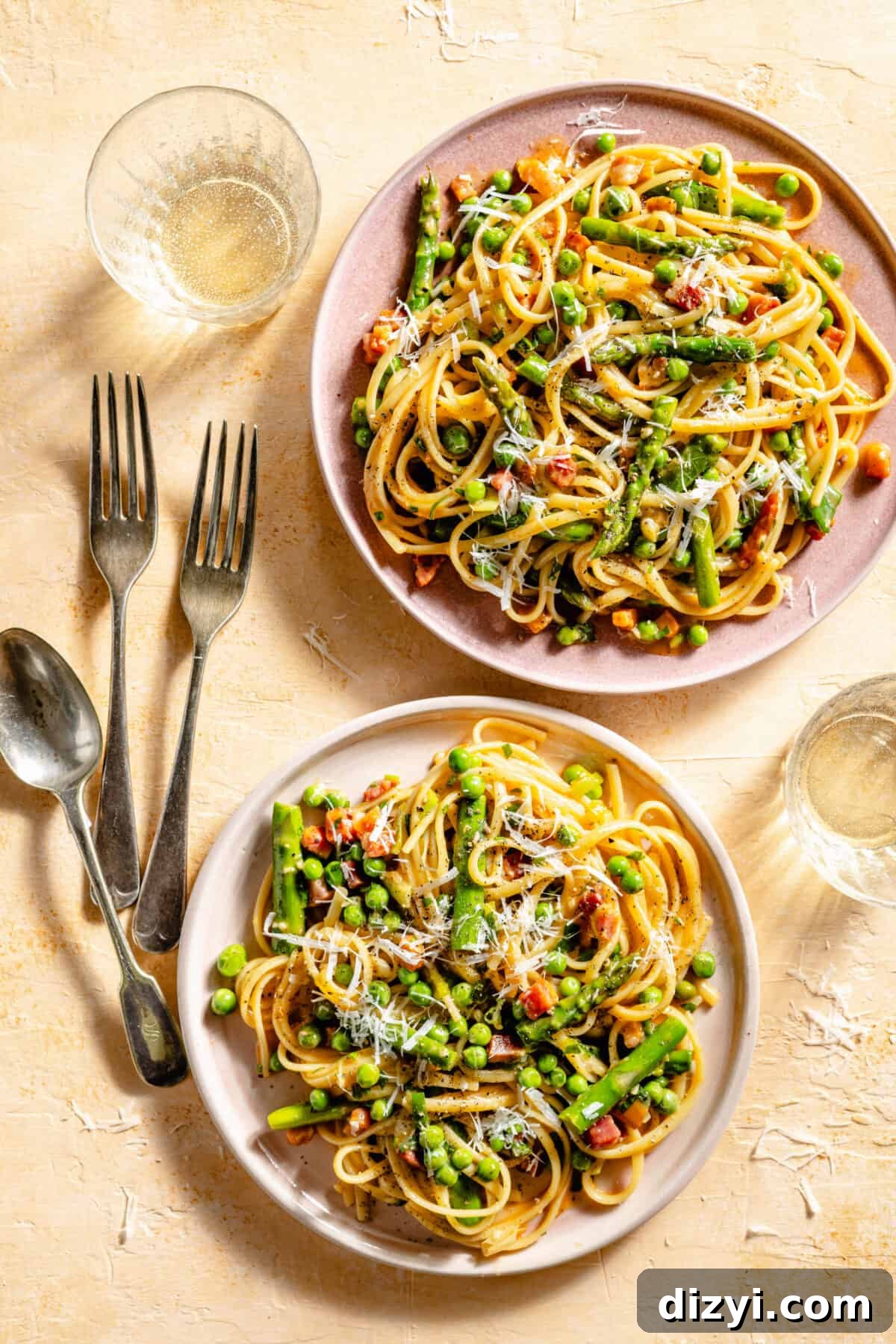 Spring Spaghetti Carbonara on two pink plates.