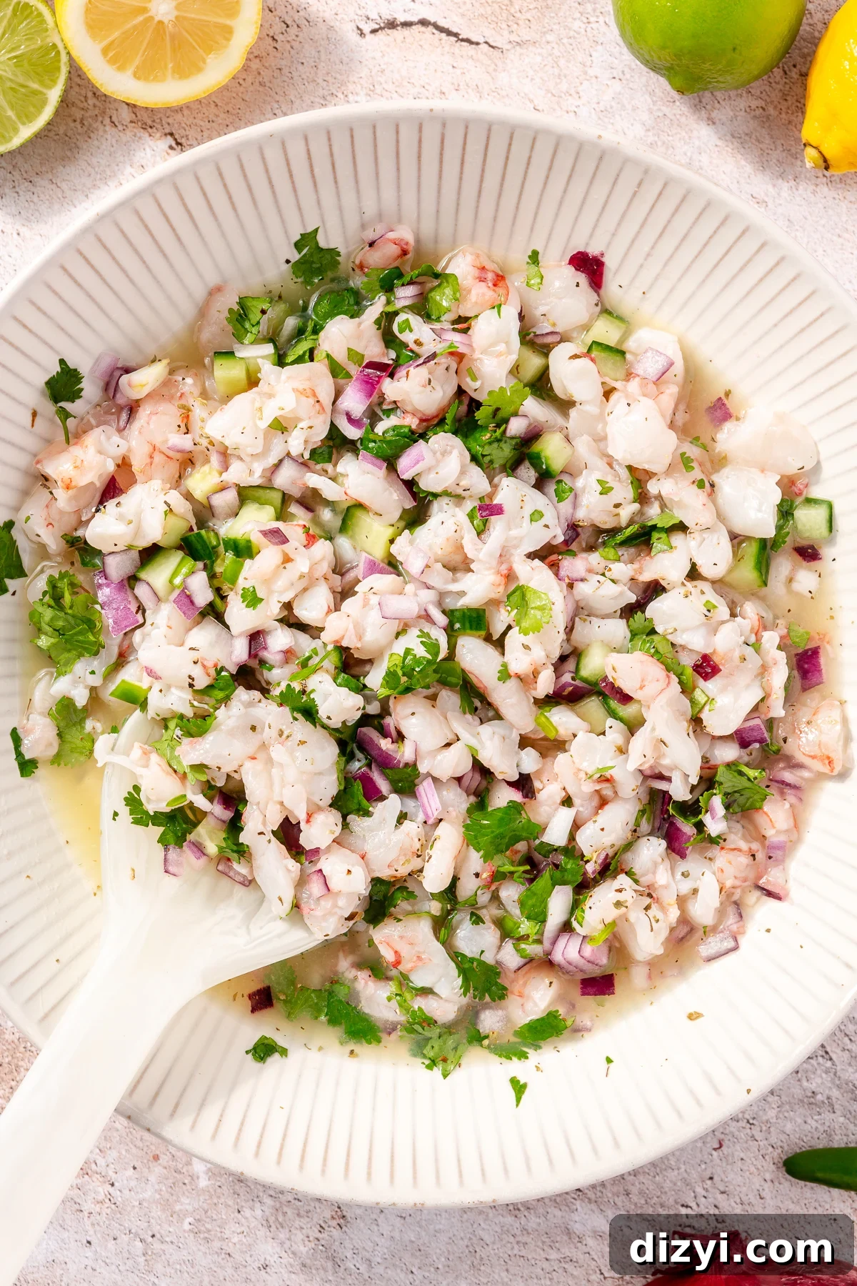Shrimp Ceviche combined in large white bowl.