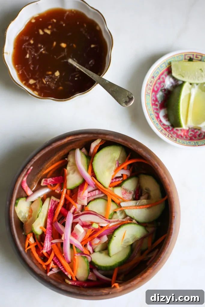 Lime and fish sauce slaw with colorful radishes and carrots