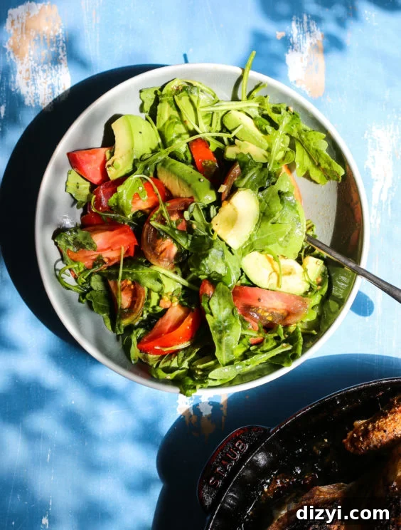 Avocado and tomato salad with arugula