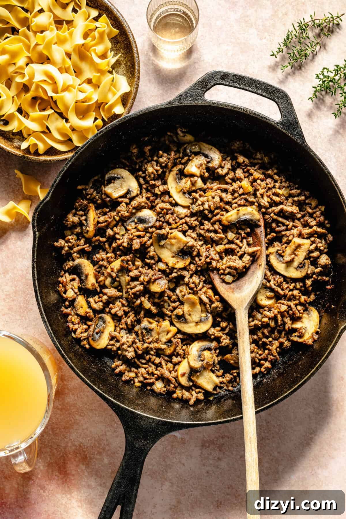 One-Pot Beef Stroganoff with Ground Beef 4 ground beef and mushrooms in a cast-iron skillet
