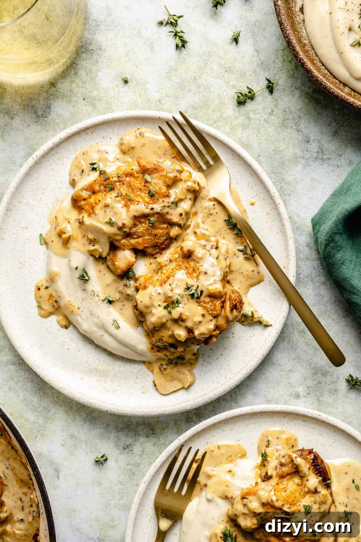 French Chicken with Creamy Mustard-White Wine Sauce on plate with cauliflower mash.