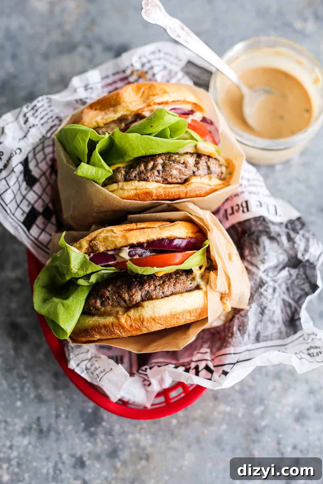 Juicy Stovetop Burger Recipe with Homemade Sauce 2 Juicy indoor burgers on a plate
