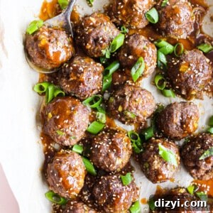Baked Mongolian meatballs glazed and garnished with green onion