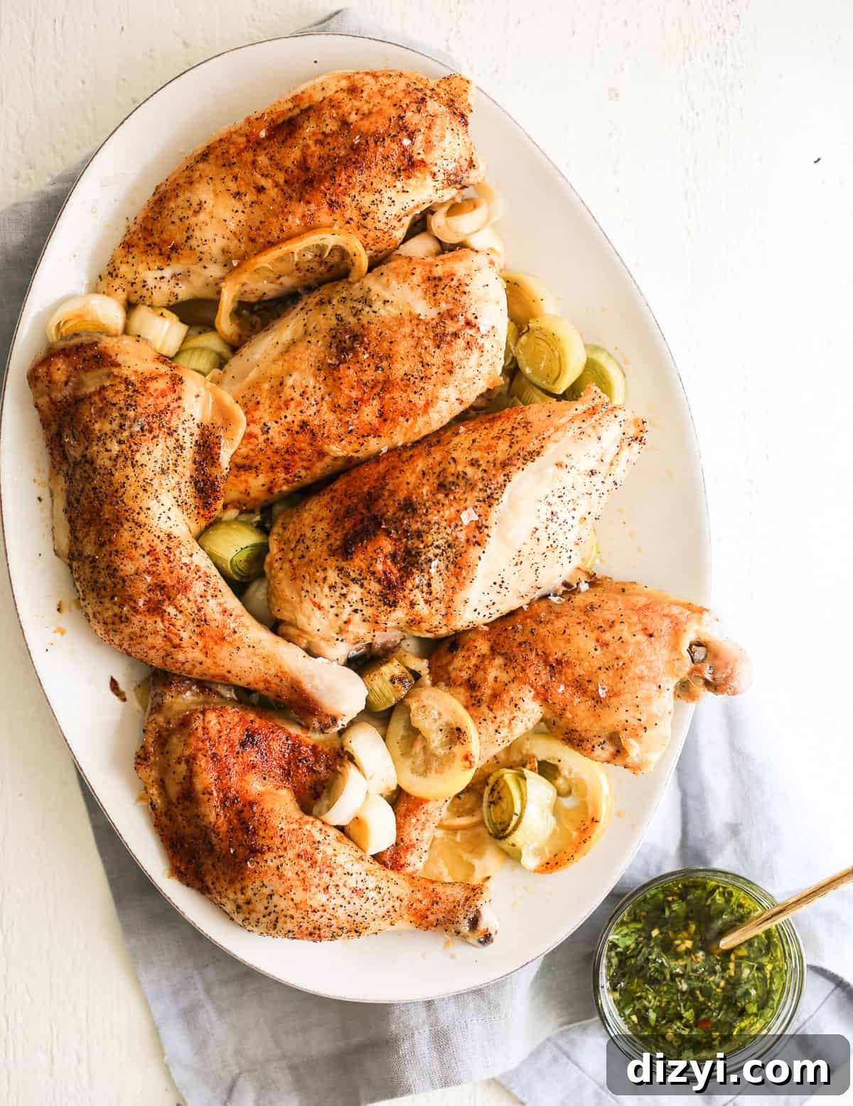 sheet pan roasted chicken with leeks and tarragon chimichurri