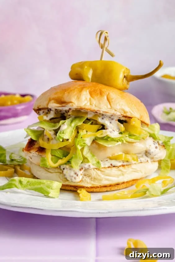 Memorial Day Weekend Near You: Events, Sales, Getaways 28 Pepperoncini Grilled Chicken Sandwich on plate.
