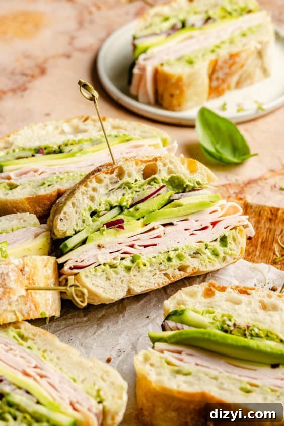 Memorial Day Weekend Near You: Events, Sales, Getaways 29 Close up of Green Goddess Party Sandwiches sliced on wood tray.