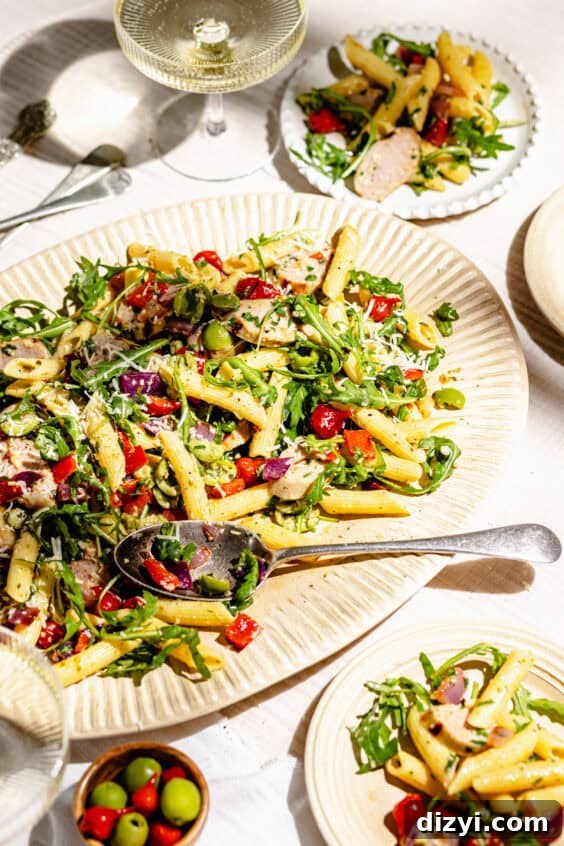 Father's Day Dinner Ideas Dad Will Love 13 Grilled Antipasto Pasta Salad on serving platter and plates.