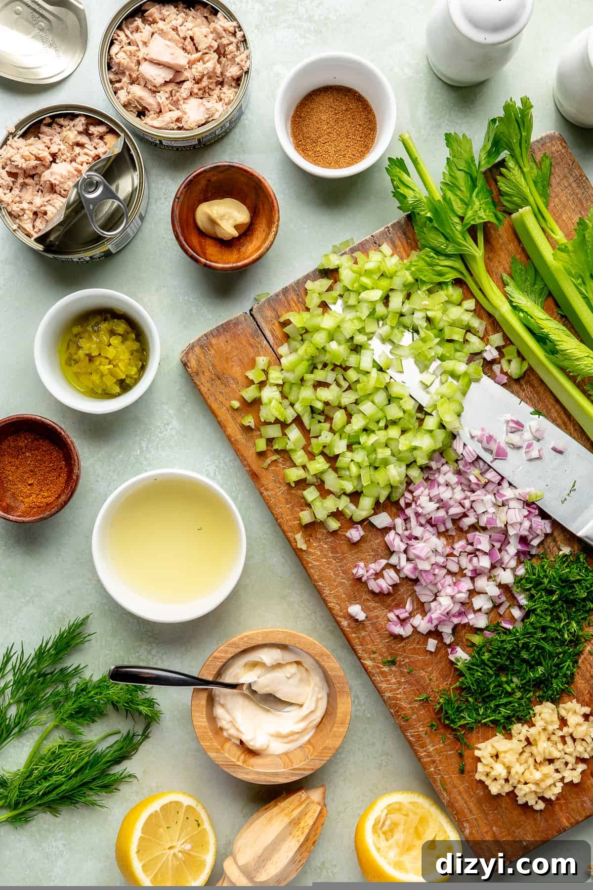 Classic Tuna Salad ingredients scattered around