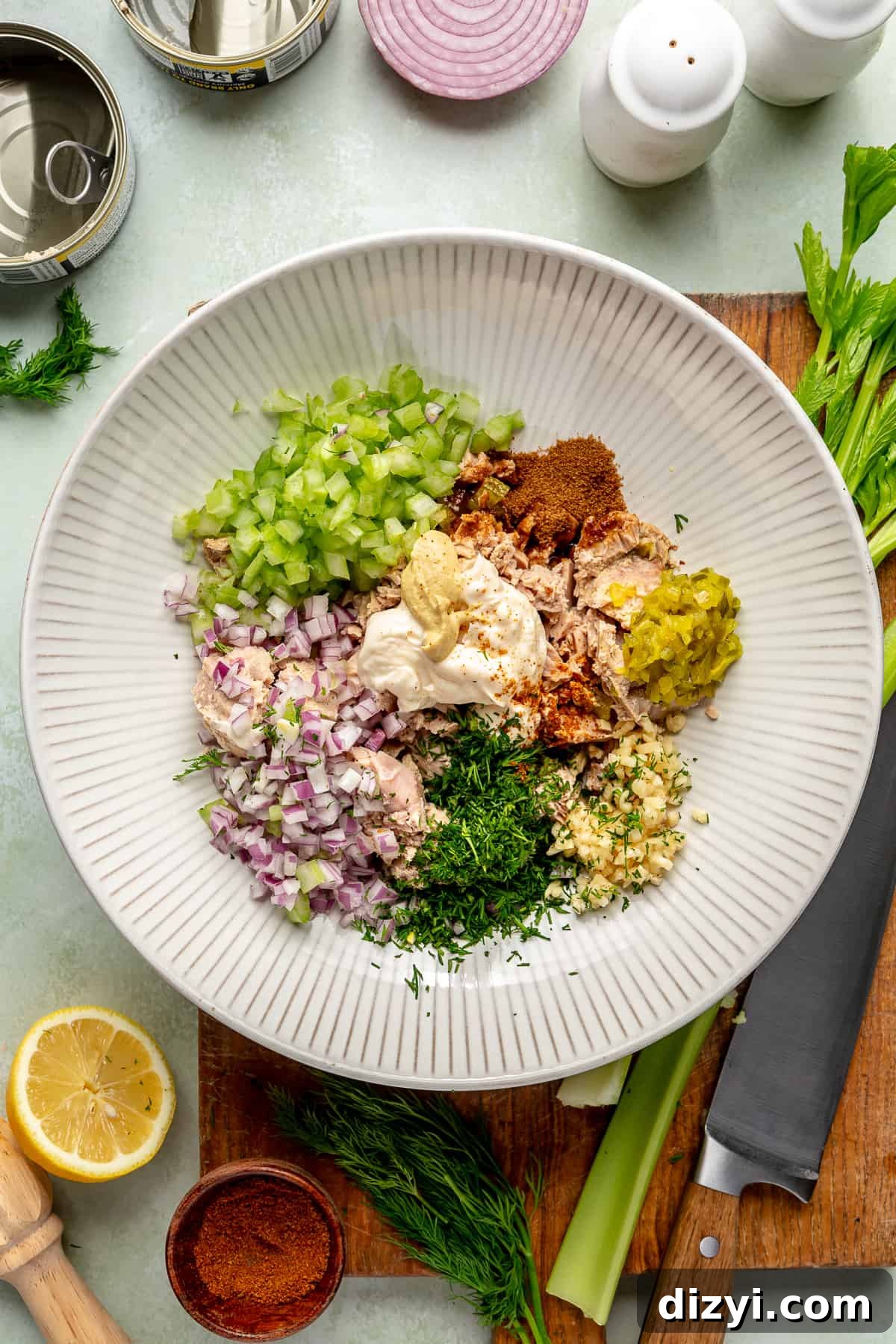 Classic Tuna Salad ingredients in large bowl not combined