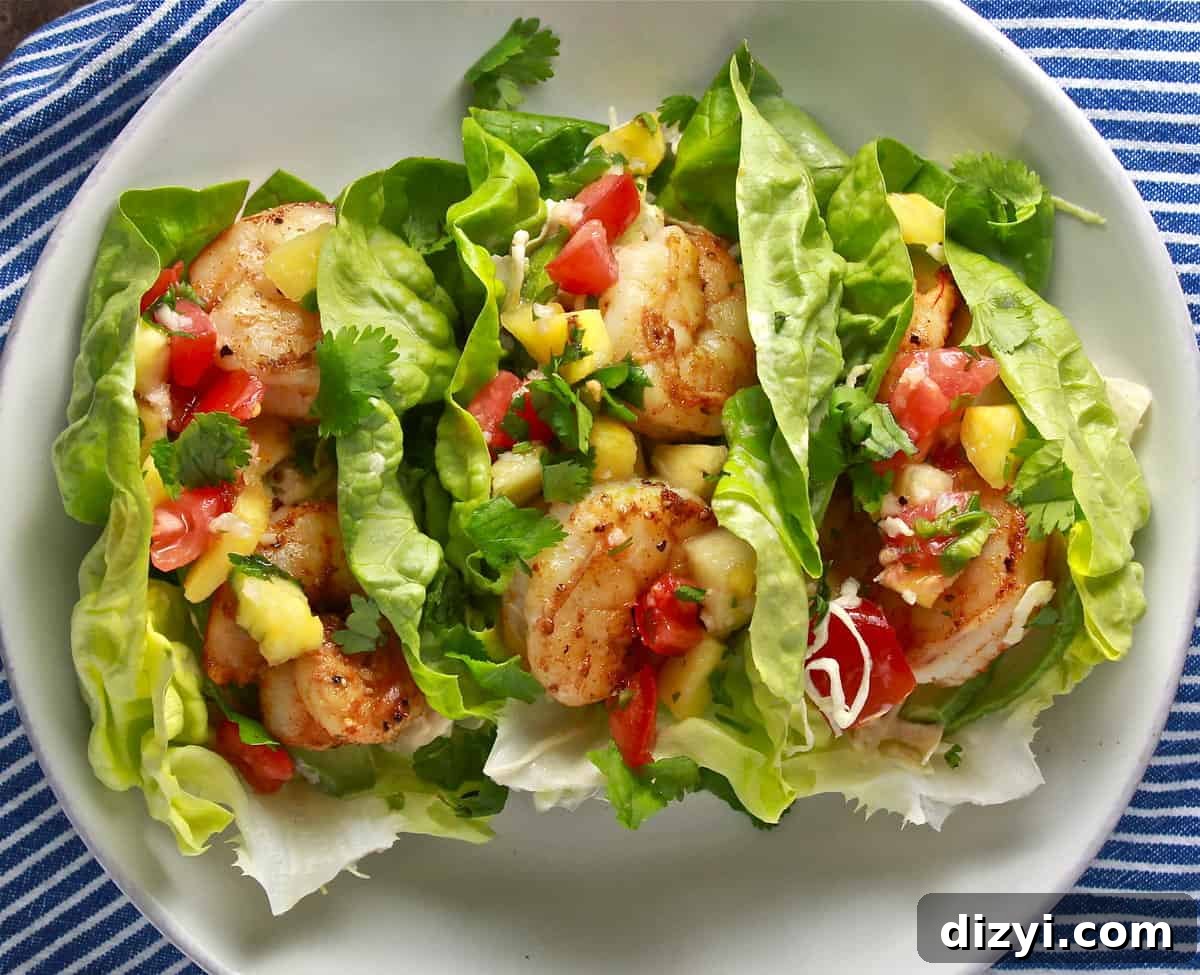 shrimp lettuce cup tacos with pineapple pico and chipotle lime coleslaw