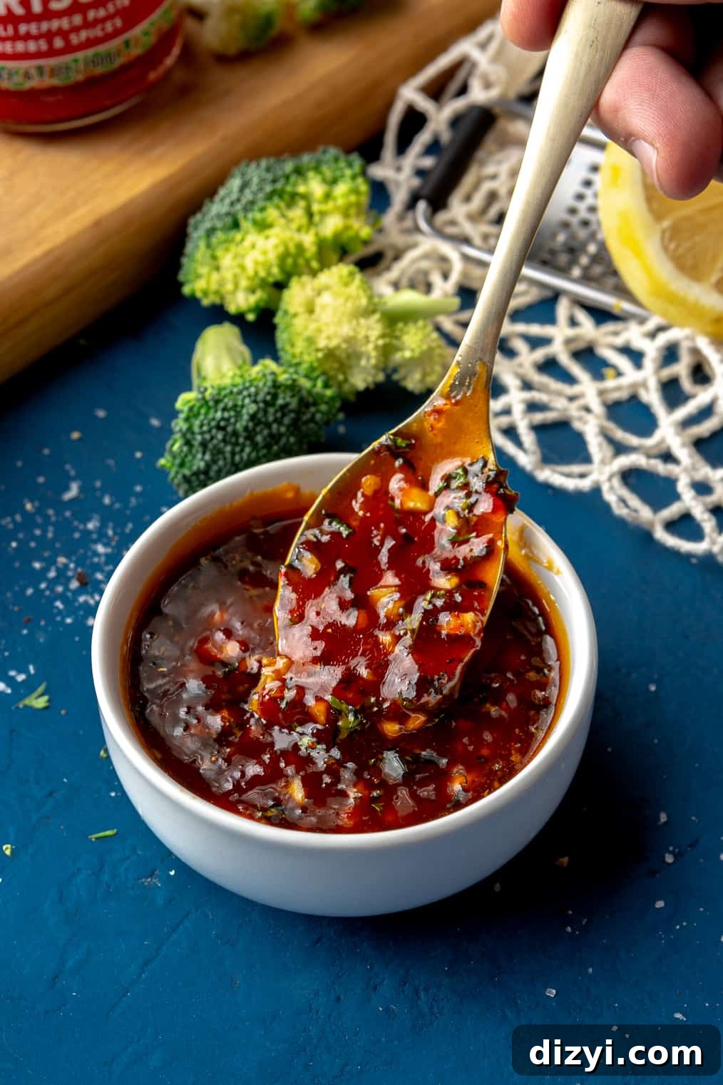 Sheet Pan Salmon + Broccoli with Harissa-Honey-Butter Drizzle