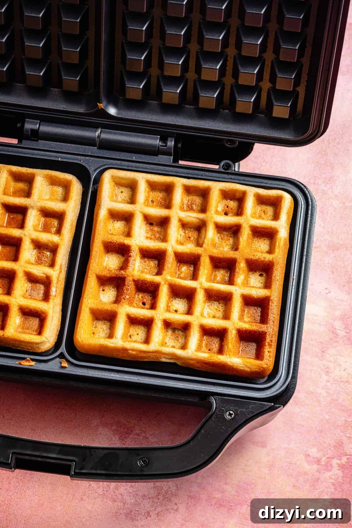Paleo Protein Waffles in waffle iron.