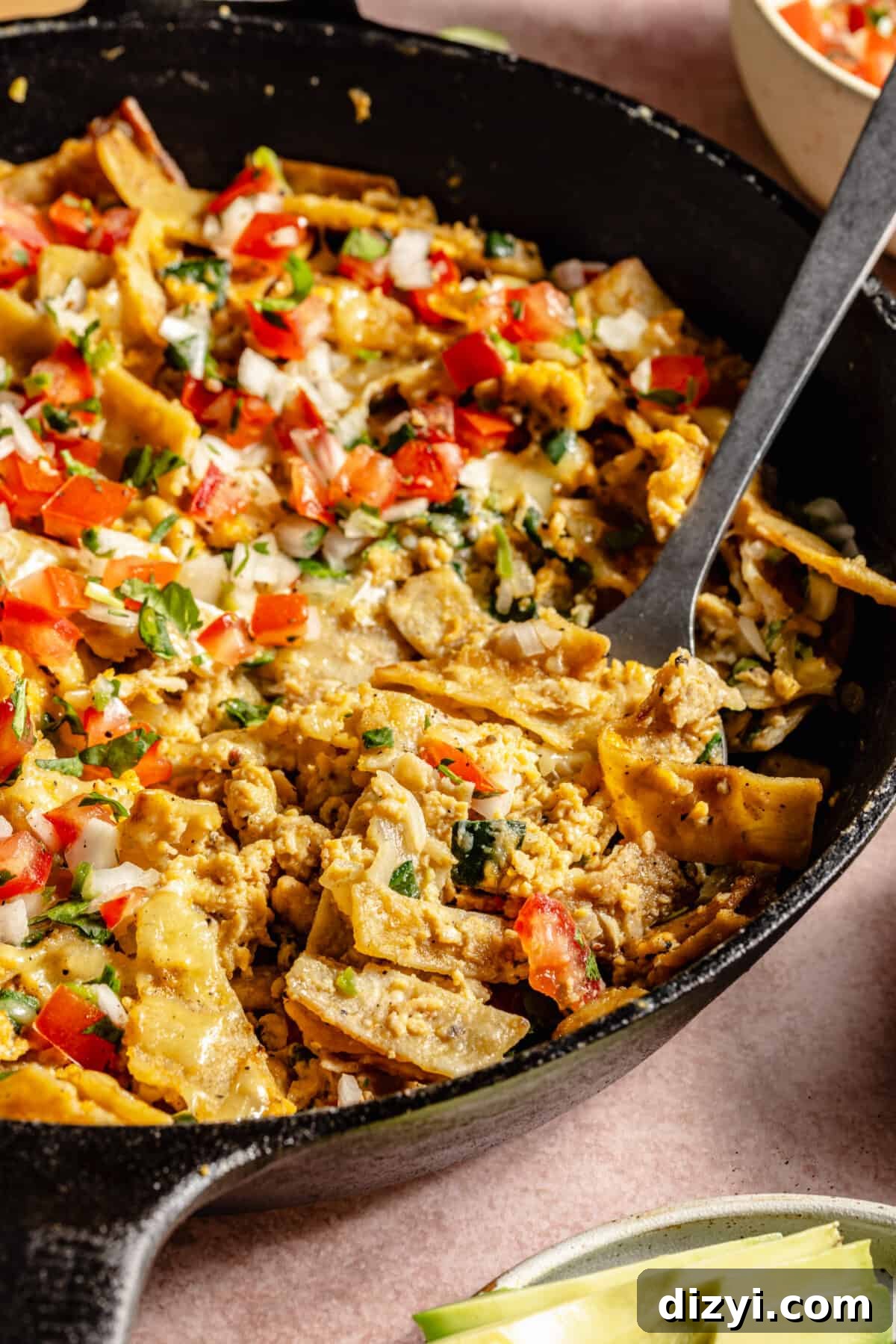 Tex-Mex Migas: Eggs, Salsa and Crispy Tortilla Chips 7 Close up of Tex-Mex Migas in cast iron skillet.