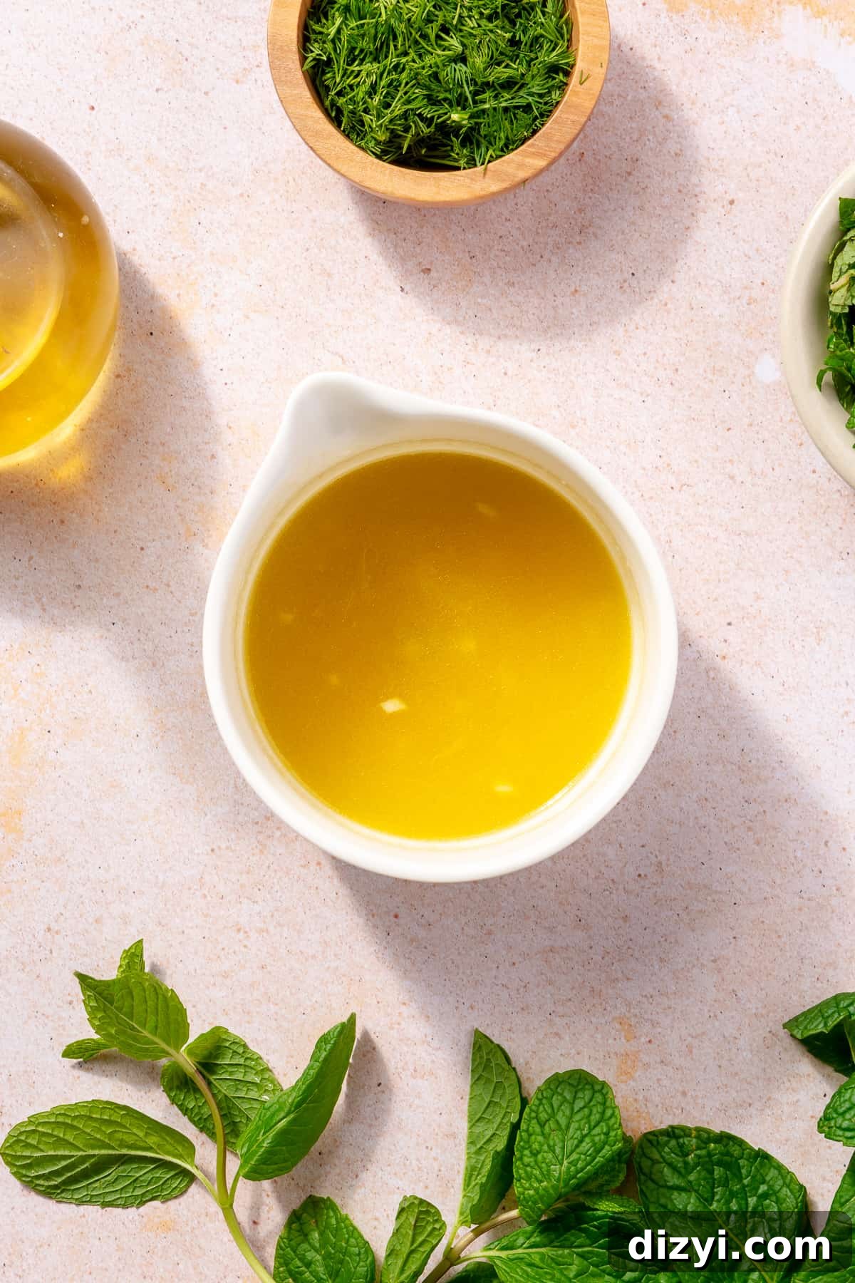Dressing for quinoa salad in small bowl.