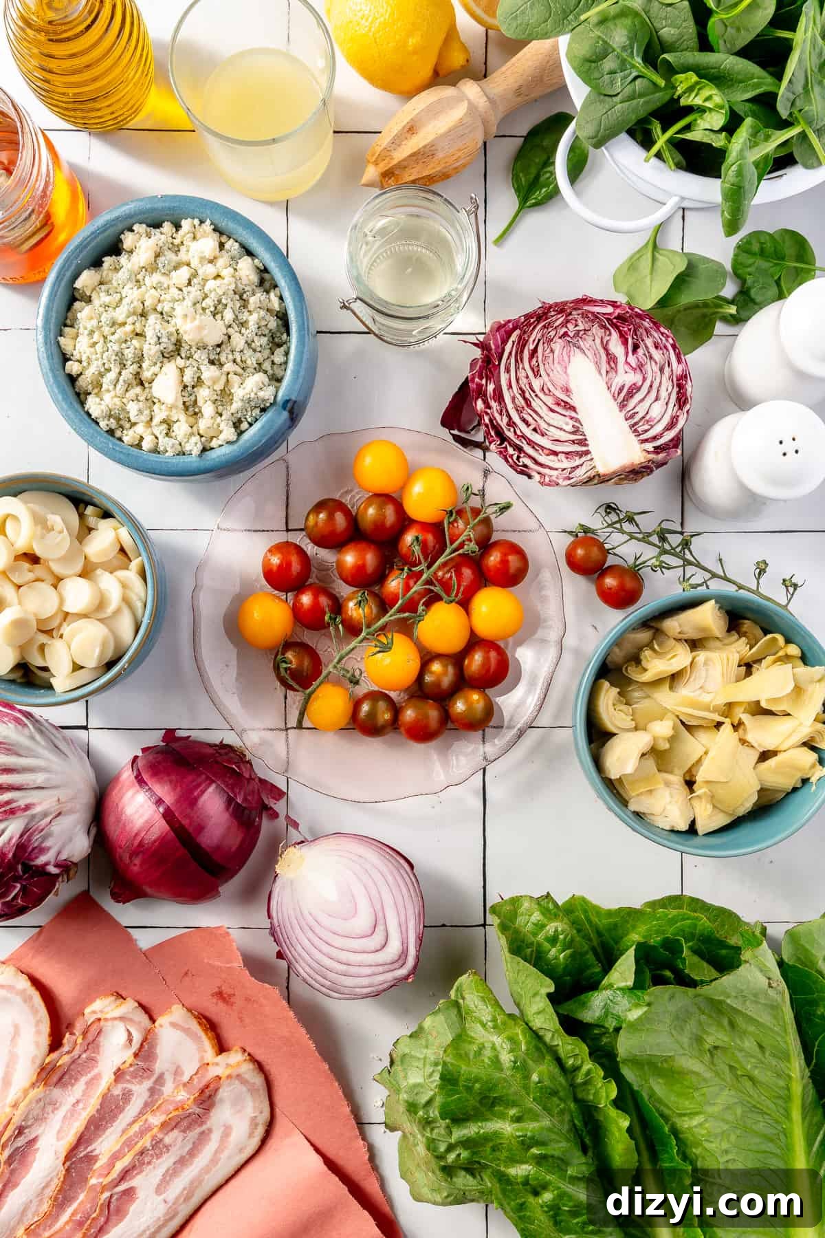 Steakhouse Chopped Salad ingredients all on a tiled backdrop.