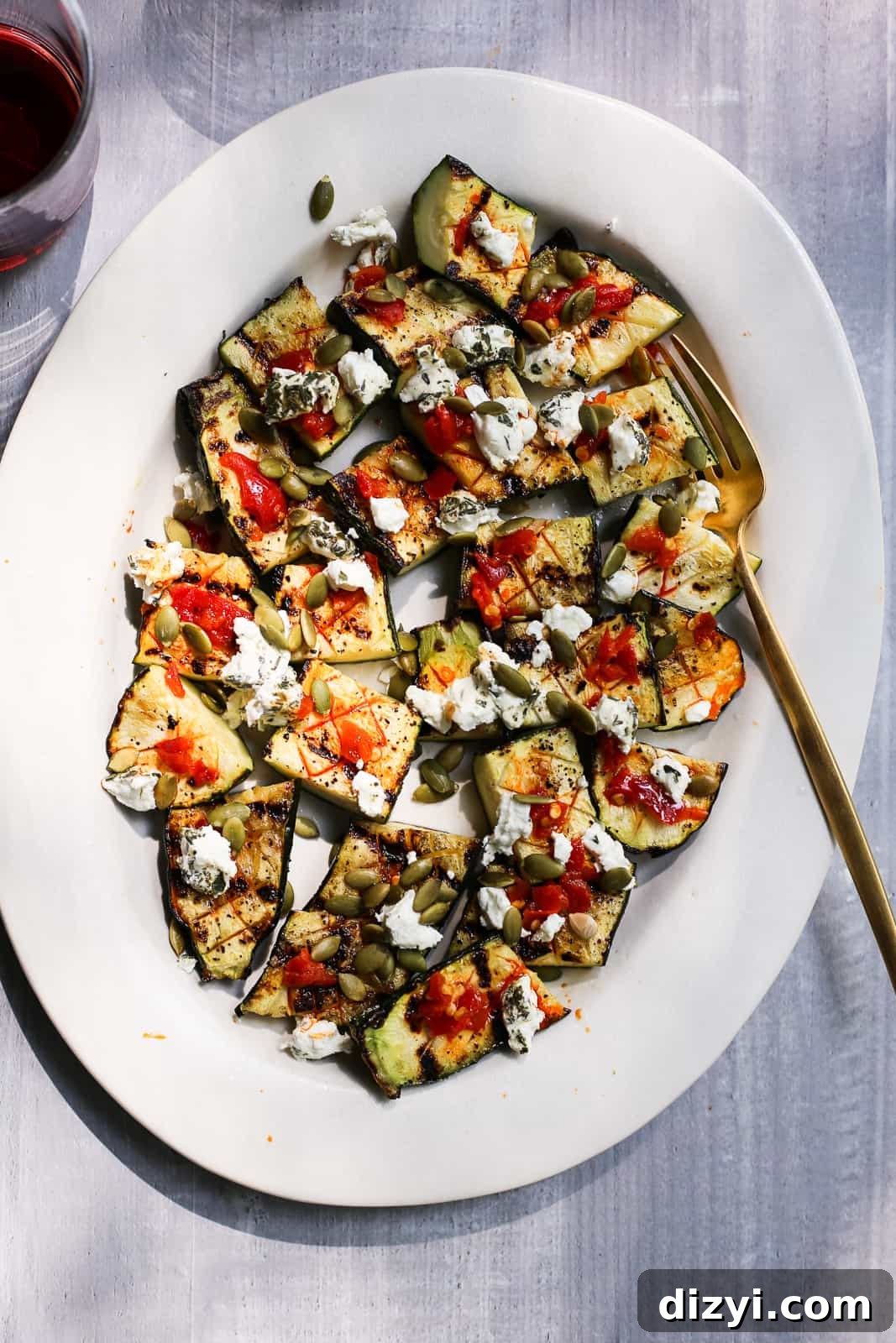 Grilled Zucchini with Calabrian Chiles, Goat Cheese, and Pepitas