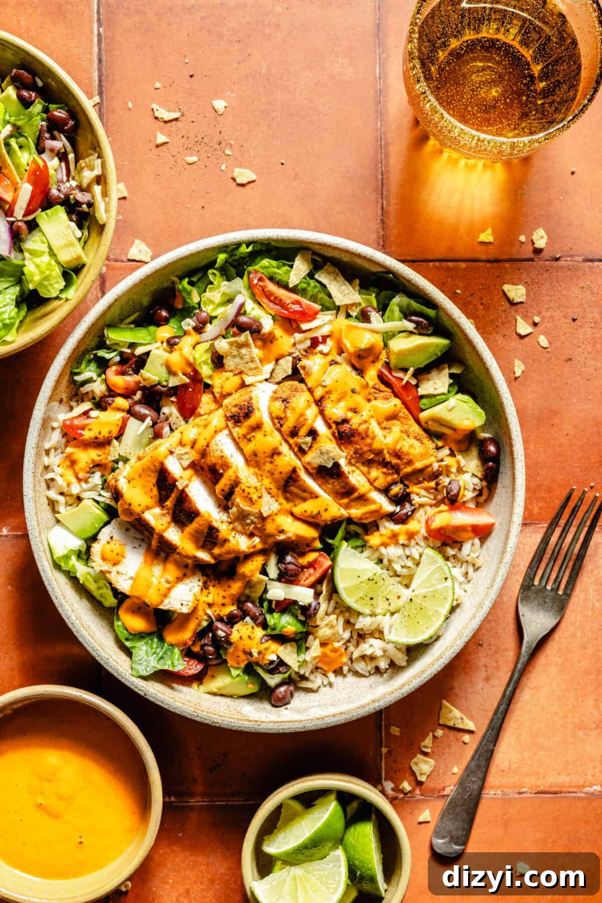 Santa Fe Chicken Bowl on tile backdrop. Drink in the corner.