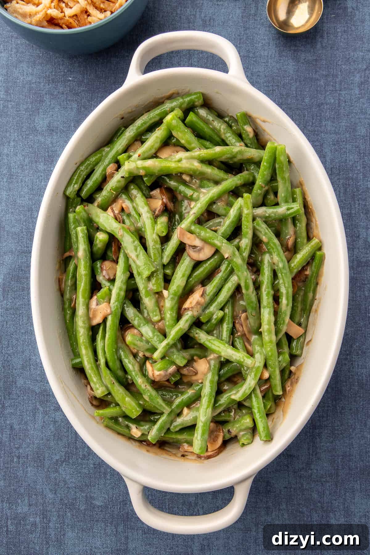 Homemade Green Bean Casserole in oval baking dish without the crispy onions