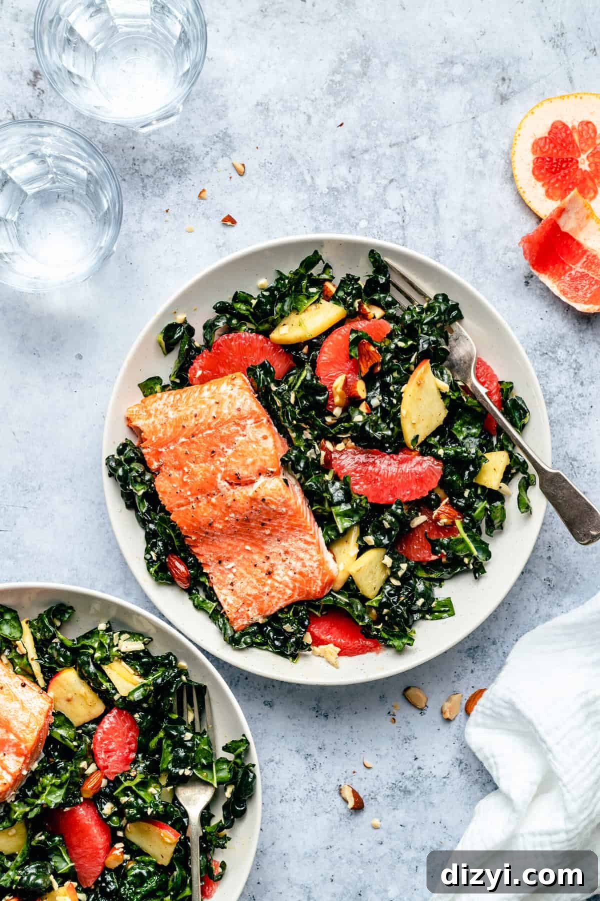 Shredded kale salad with grapefruit, apple, almonds and grated cheddar