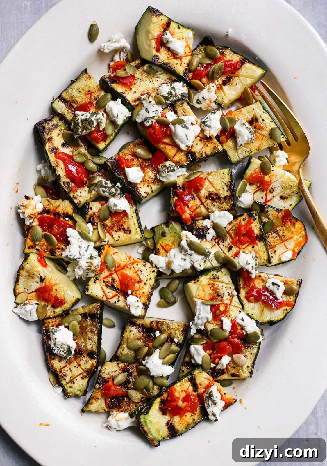 Grilled Zucchini with Calabrian Chiles, Goat Cheese, and Pepitas