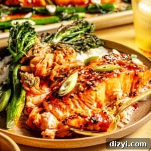 Gochujang-Glazed Sheet Pan Salmon 4 Sheet Pan Gochujang Glazed Salmon on plate with broccolini and rice.