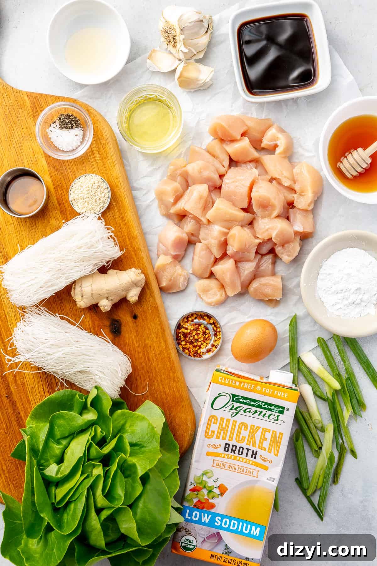 How to Make Honey Garlic Chicken Lettuce Wraps 3 Ingredients for Honey-Garlic Chicken Lettuce Wraps all laying on a flat surface.