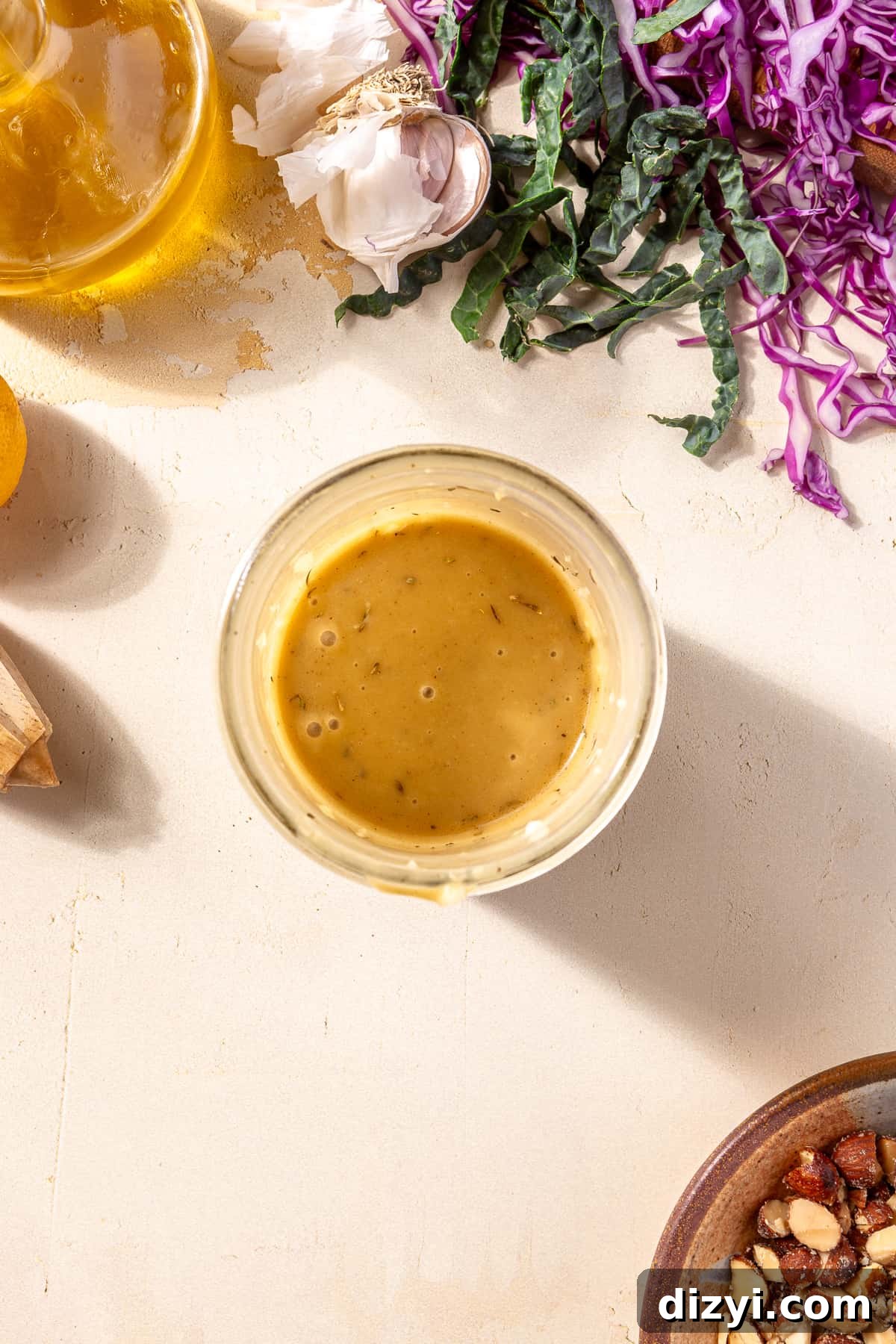 Sweetgreen Copycat Blackened Chicken and Sweet Potato Bowls 7 Hot honey dressing in small bowl for Blackened Chicken and Sweet Potato Bowls.