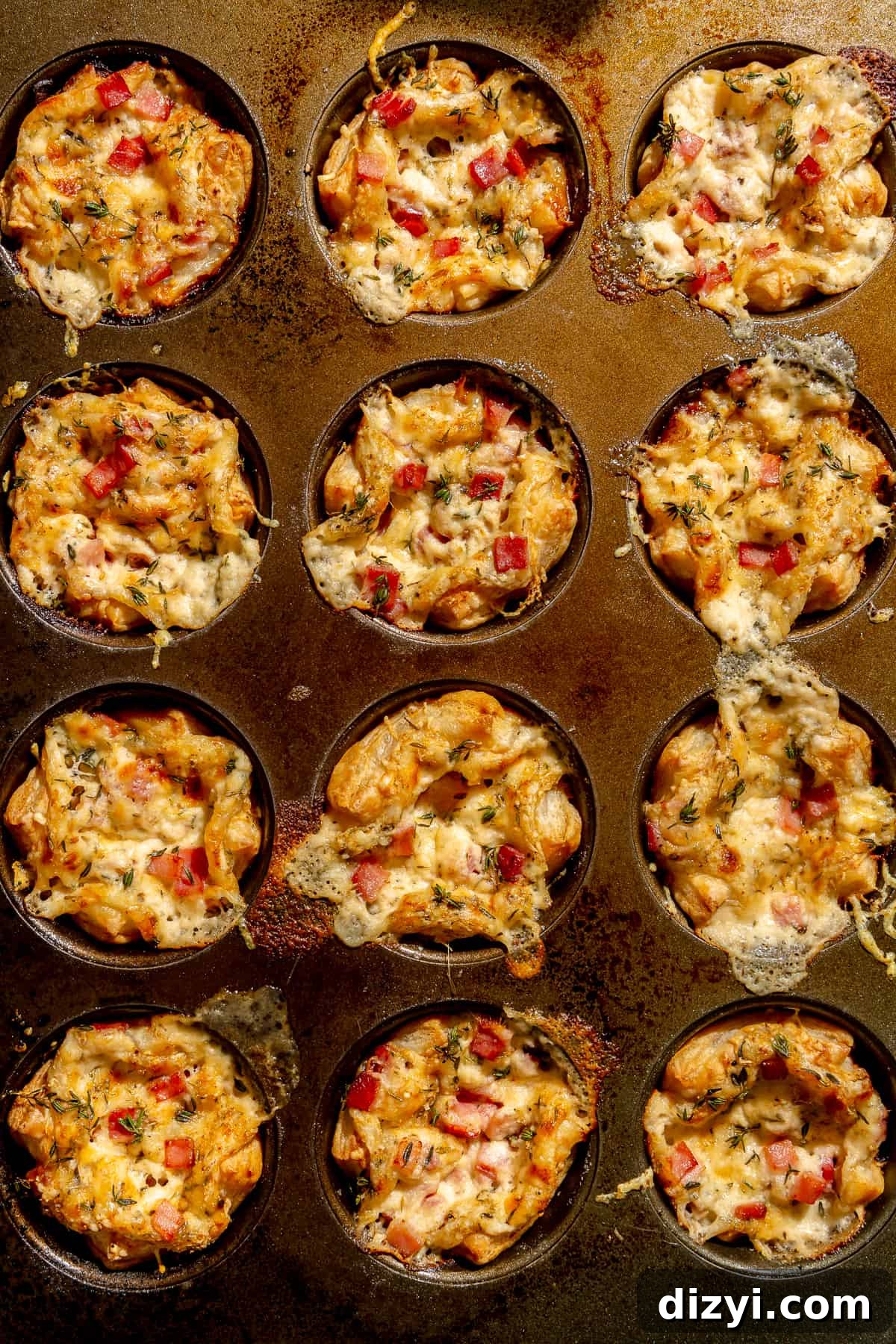 Baked Mini Croque Monsieur Bites in muffin tins.