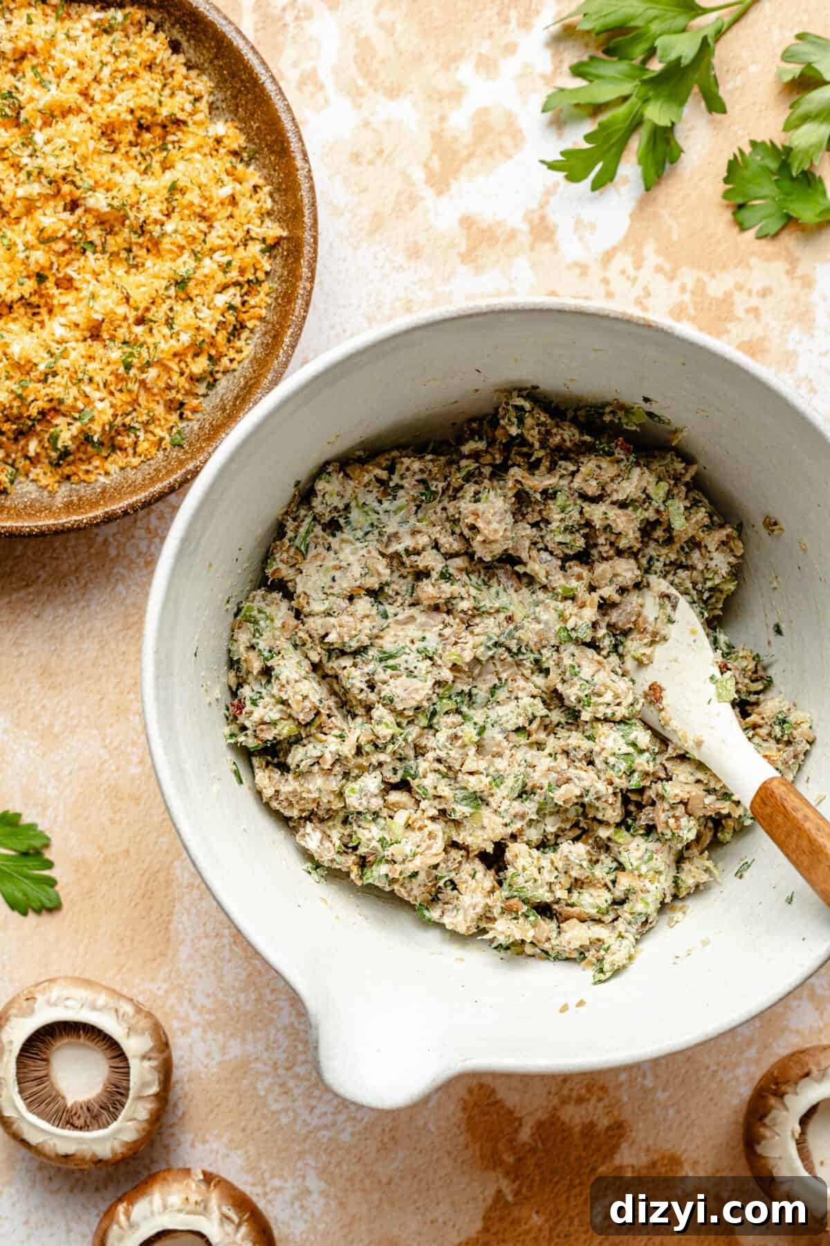 Sausage Stuffed Mushrooms with Garlic and Parmesan 5 Filling for Sausage Stuffed Mushrooms in a white bowl.