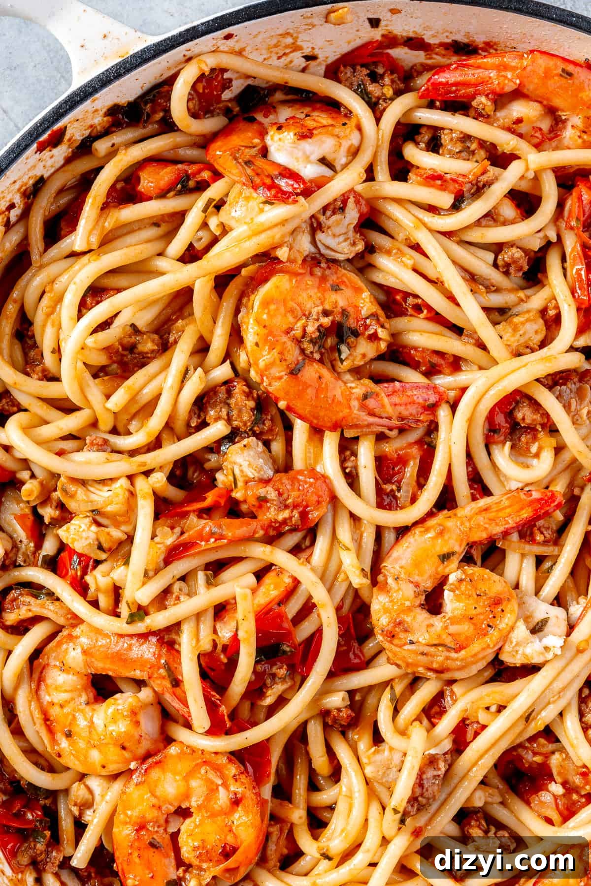 Close up of Four Seafood Pasta in a skillet.