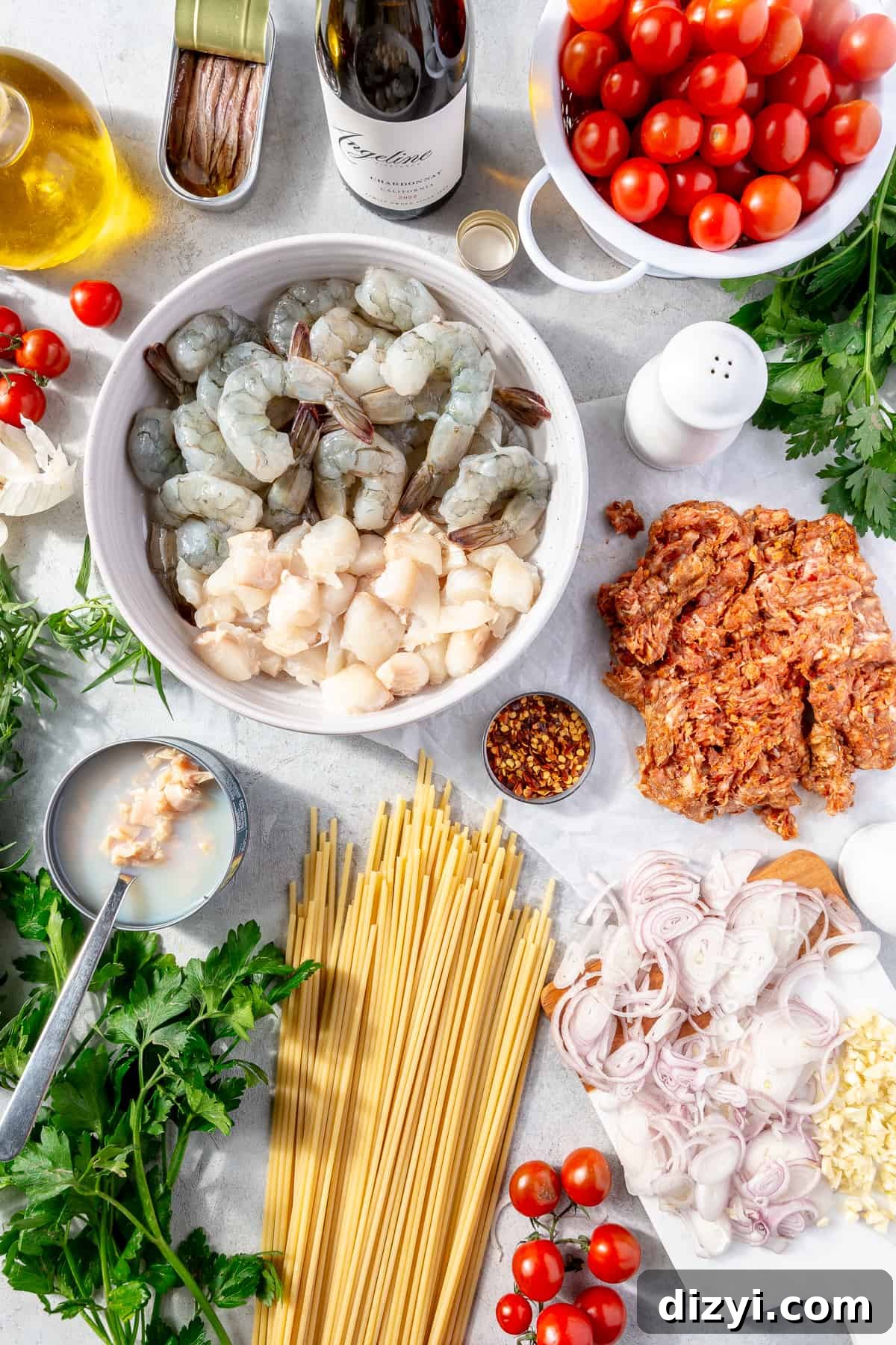Ingredients for Four Seafood Pasta all scatted around.