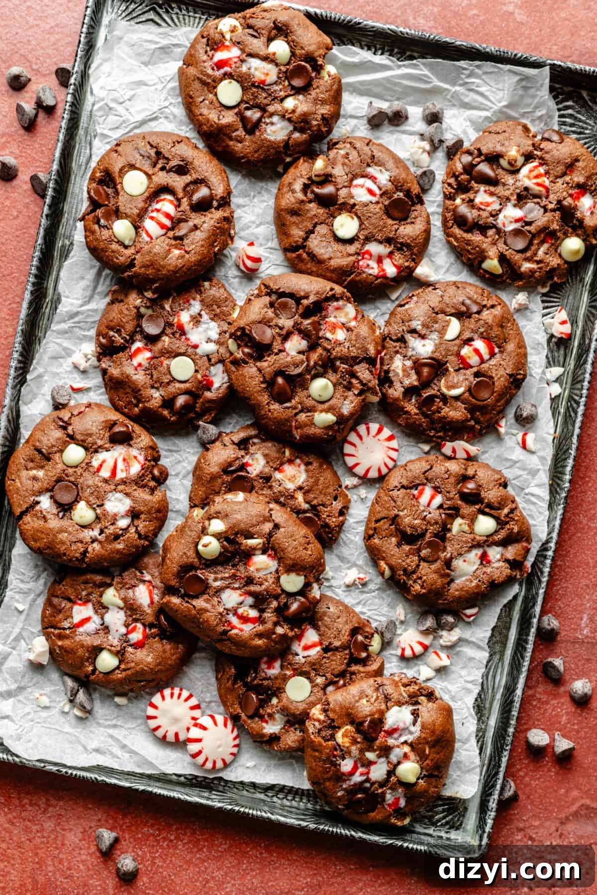 Baked Double Chocolate Peppermint Cookies on a sheet pan lined with parchment paper.