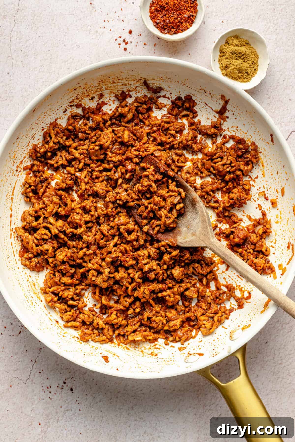 Spicy Lamb and Roasted Eggplant Labneh Recipe 6 Spicy lamb in a skillet.