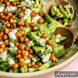 Close up photo of Cucumber Salad with Crispy Chickpeas in bowl.