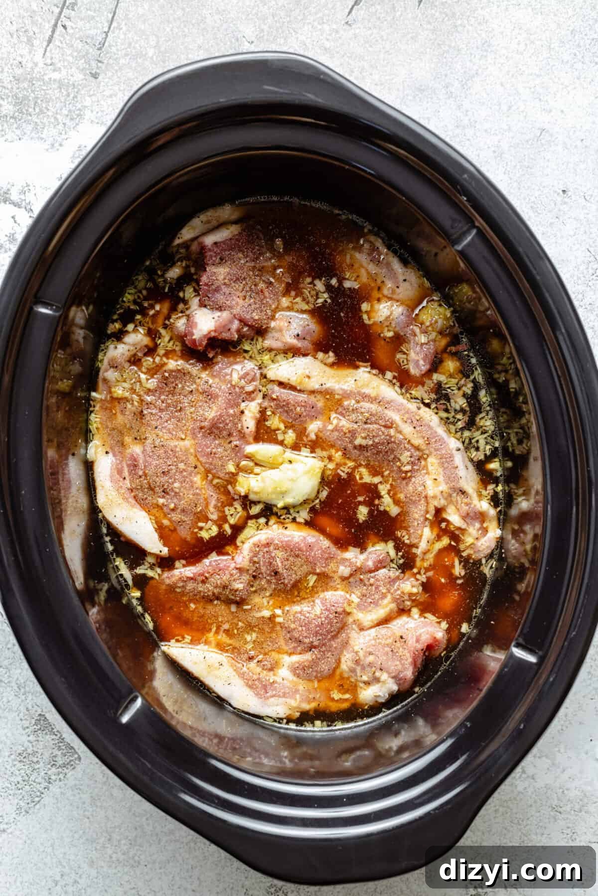 Slow Cooker Lemongrass Shredded Pork Bowls 4 Raw pork and other ingredients in slow cooker.