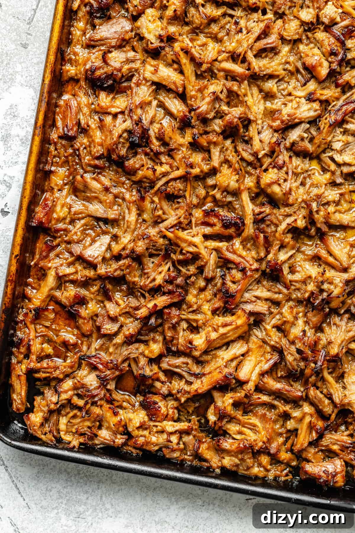Slow Cooker Lemongrass Shredded Pork Bowls 6 Shredded, crispy pork on sheet pan.