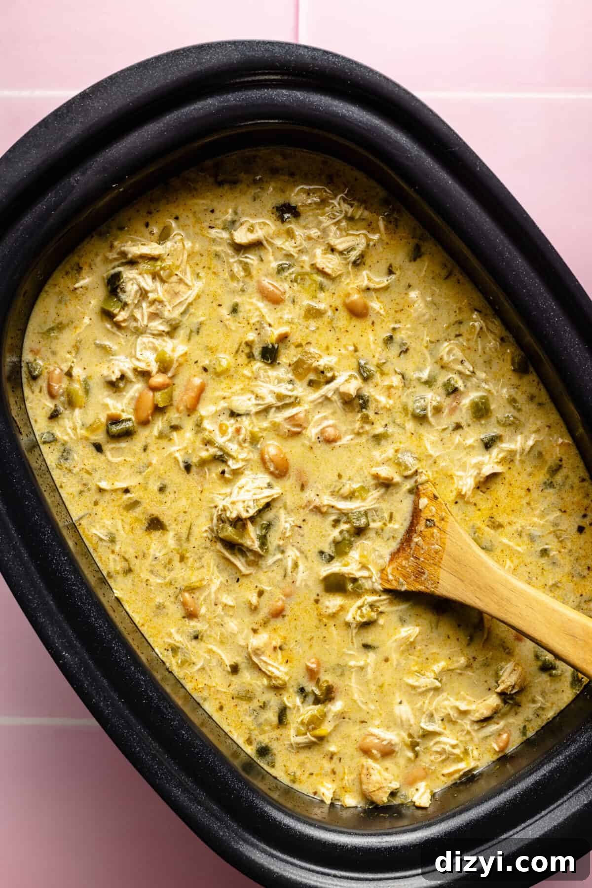 Slow Cooker Green Enchilada Chicken Soup Recipe 6 Slow Cooker Green Enchilada Chicken Soup in a slow cooker.