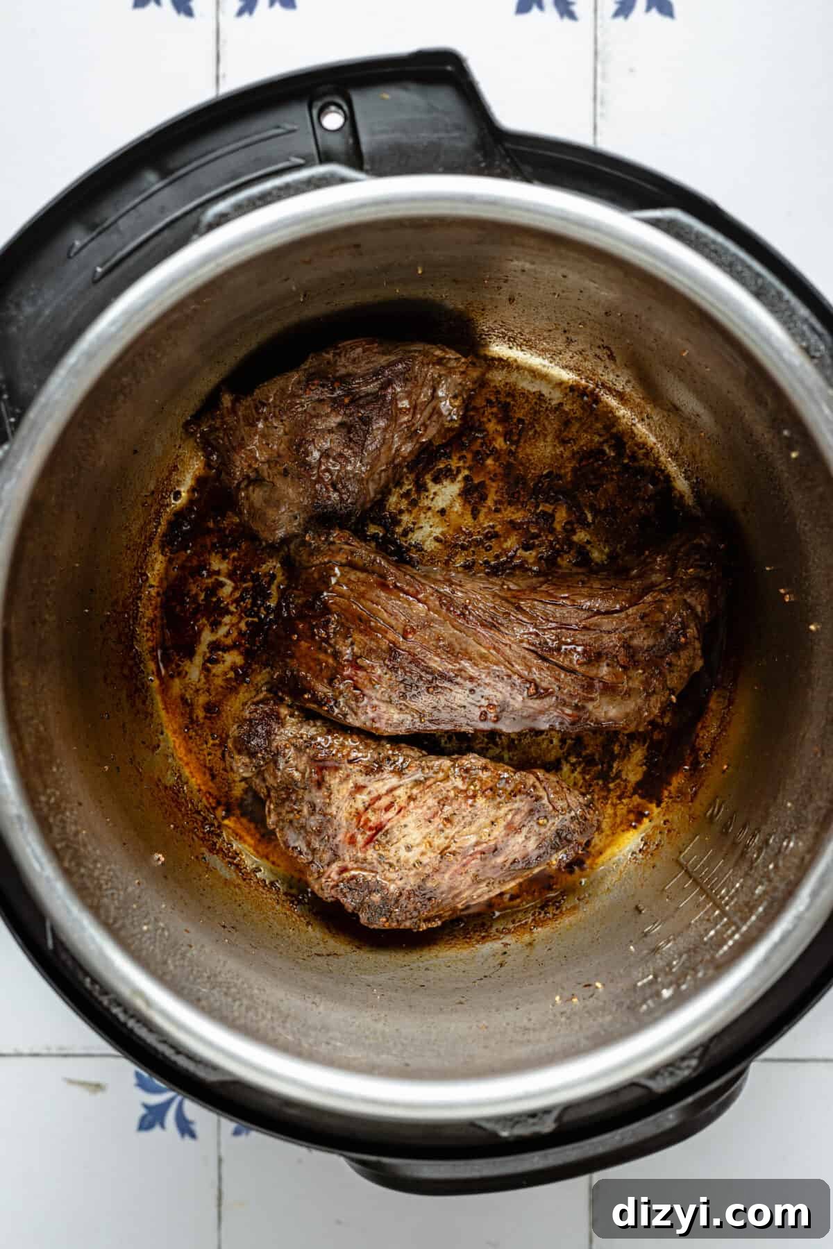 Instant Pot Greek Shredded Beef Bowls 3 Browned beef in Instant Pot.