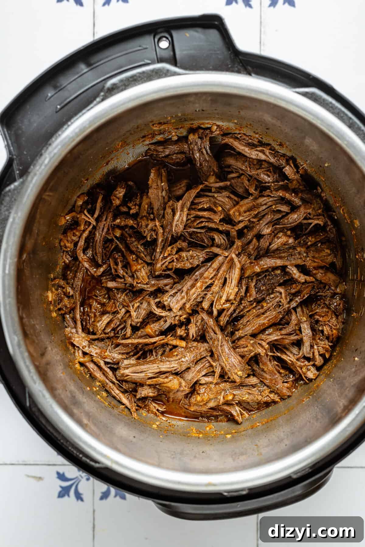 Instant Pot Greek Shredded Beef Bowls 5 Shredded beef in Instant Pot.