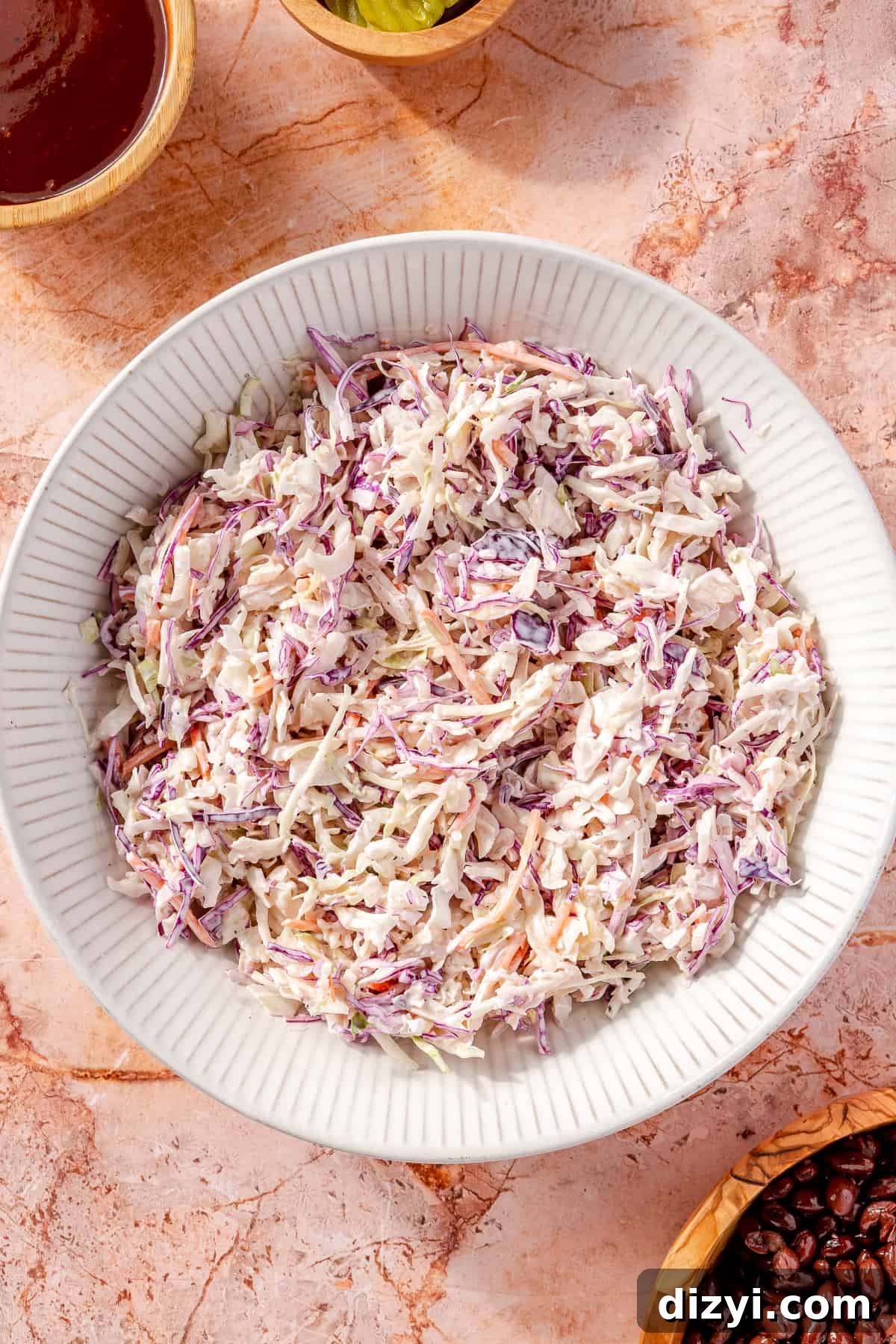 Coleslaw in white bowl.