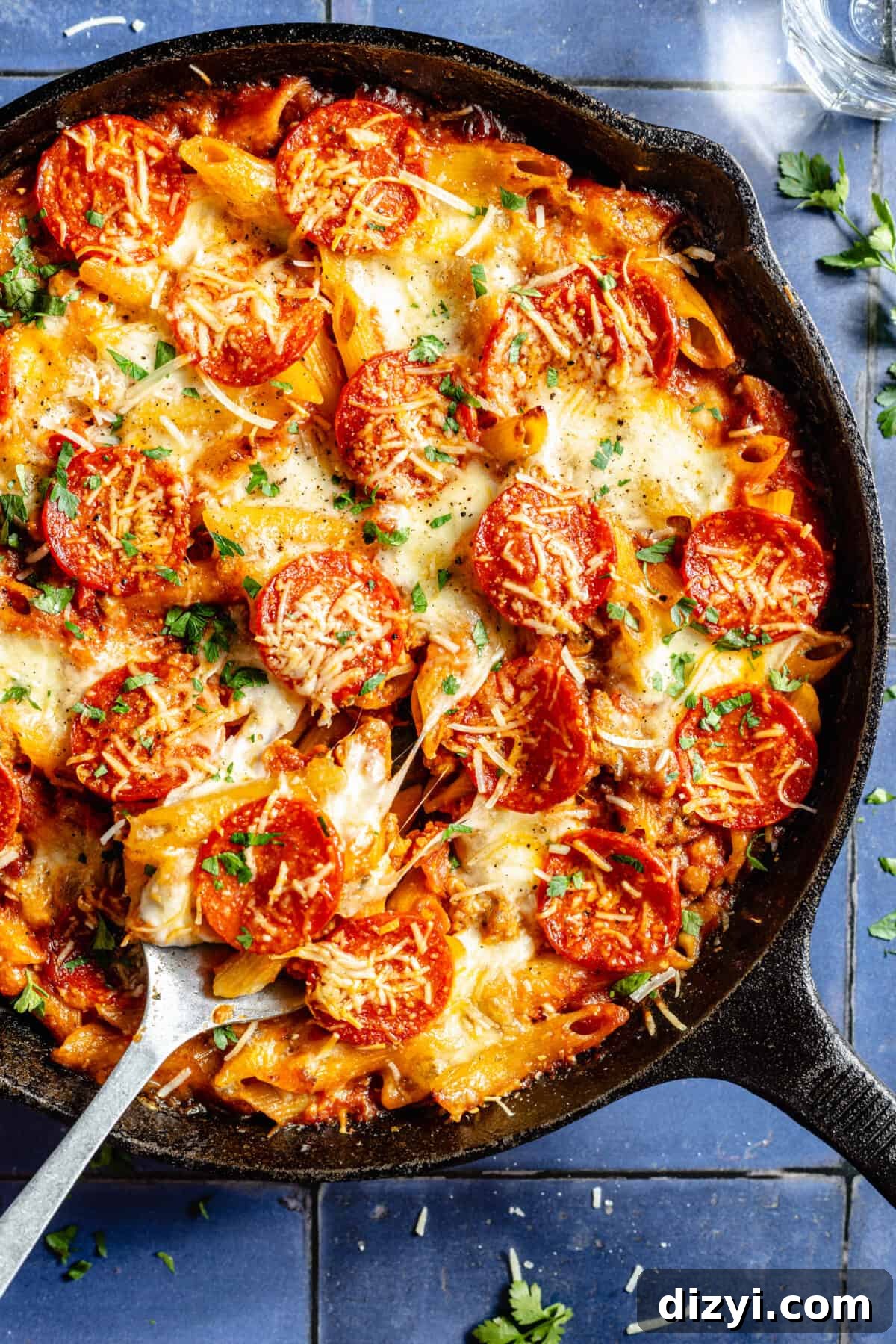 Skillet Pizza Penne: Cheesy One-Pan Pasta 3 Skillet Pizza Penne with spoon in it.