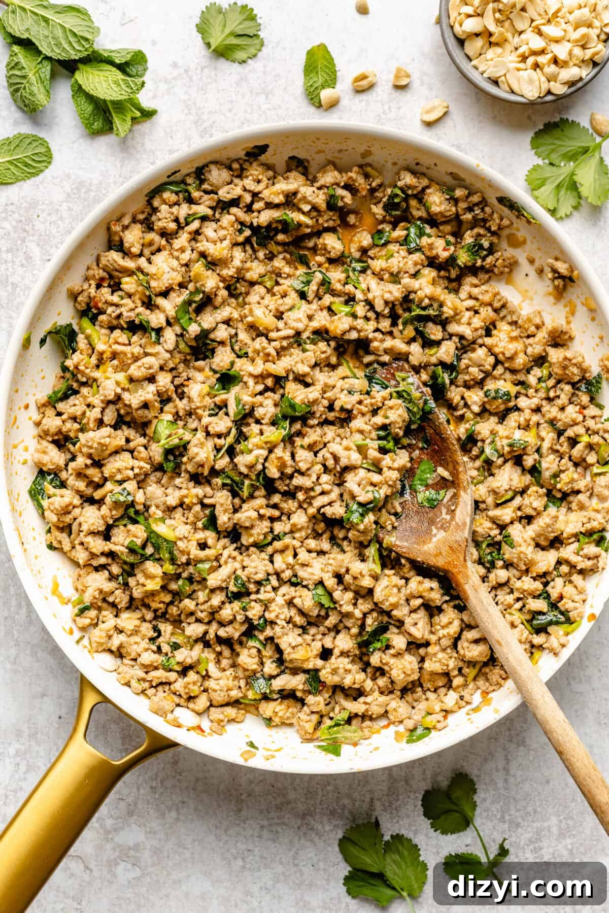 Spicy Miso Chicken Salad with Sesame Dressing 5 Cooked ground chicken mixture in white skillet.