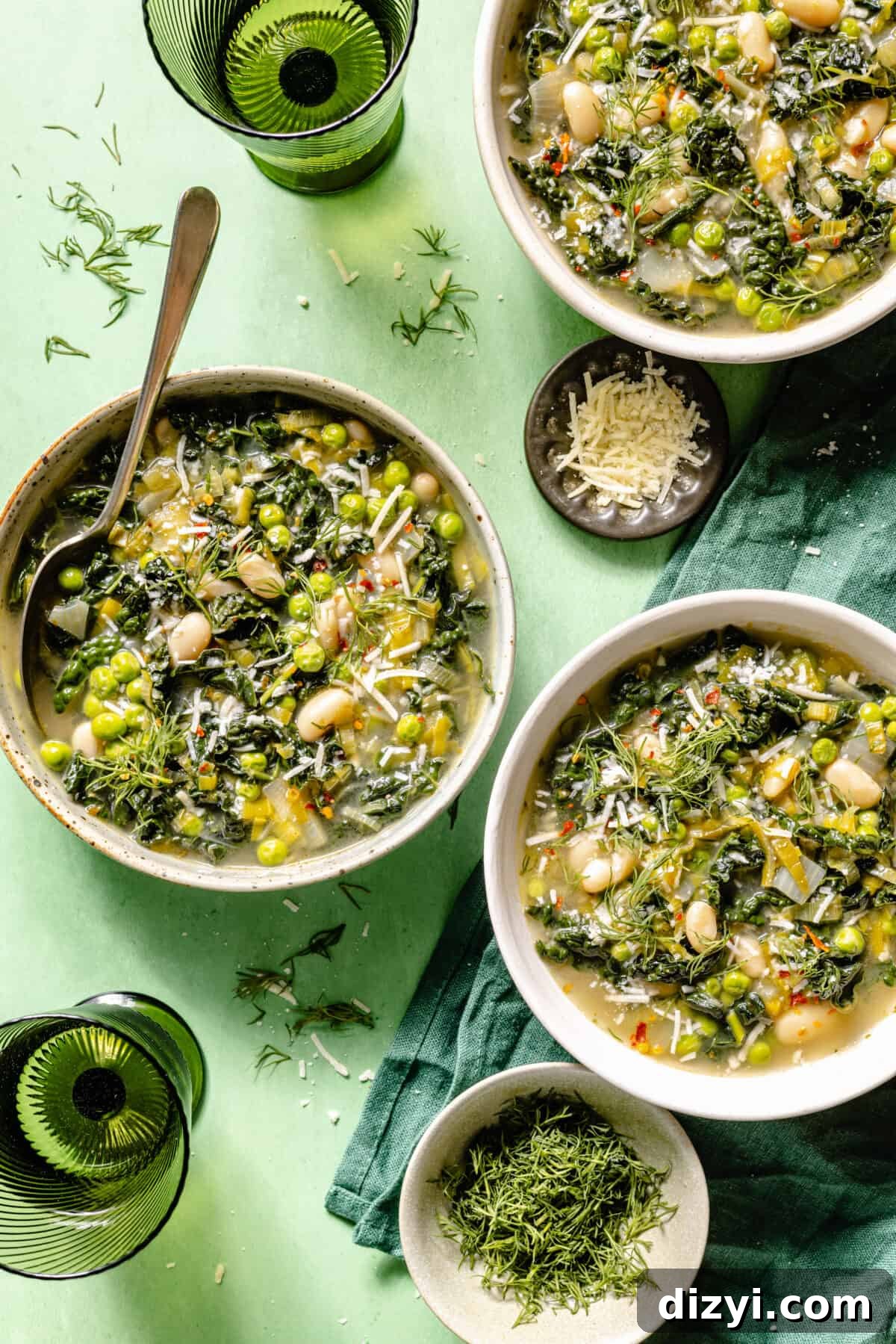 Spring Green Minestrone Soup Recipe with Fresh Spring Vegetables 2 Spring Green Minestrone in three bowls on green backdrop.
